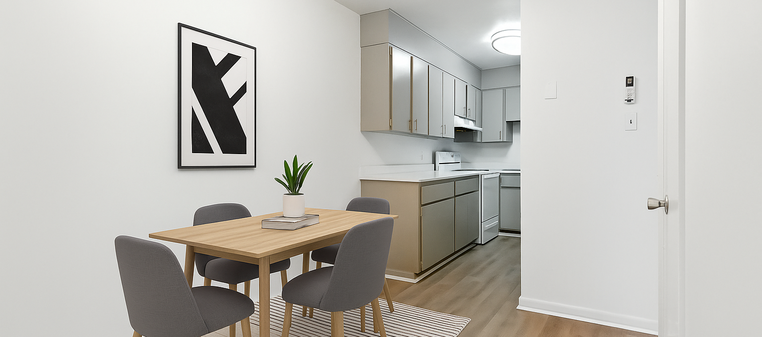 a dining room table and chairs in a room